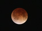 Rare Lunar Eclipse Cast Red Cast Over Moon